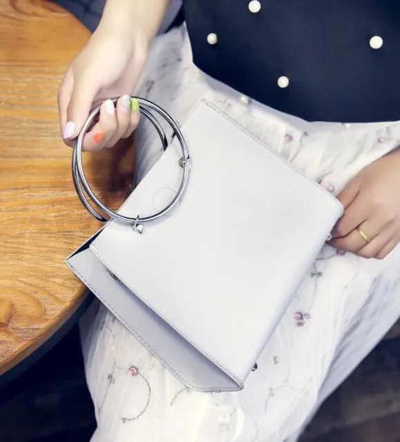 Free shipping 2019 Concentric ring personality shoulder handbag noble temperament bag Fashion Nova Bags